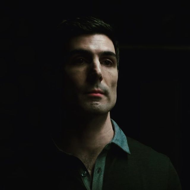 Louis Cancelmi in a dark green t-shirt.